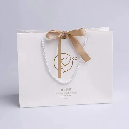 White Gift Bag with Gold Ribbon
